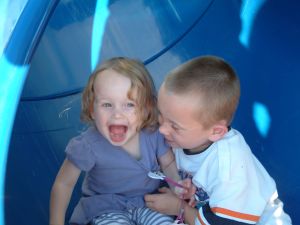 Samantha and Matthew enjoying the playground