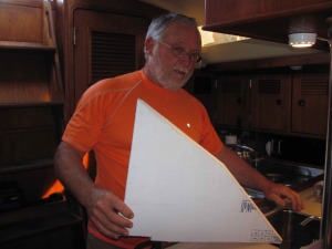 Murray holding an insulation piece showing the complex shape